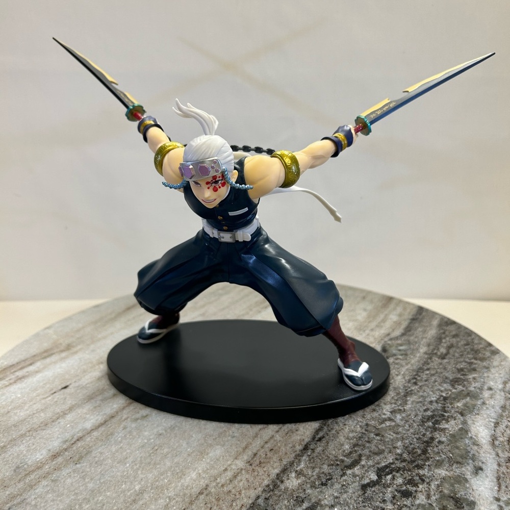 Dynamic Anime Figure with Dual Swords
